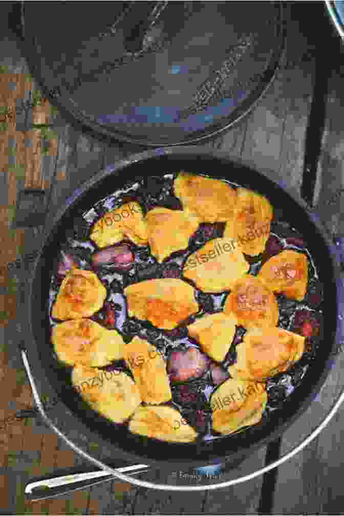 A Dutch Oven Filled With A Bubbling Fruit Cobbler, Surrounded By Fresh Berries And Whipped Cream. Best Dutch Oven Dessert Cookbook For Camping: Tasty Dutch Oven Camping Desserts You Ll Love