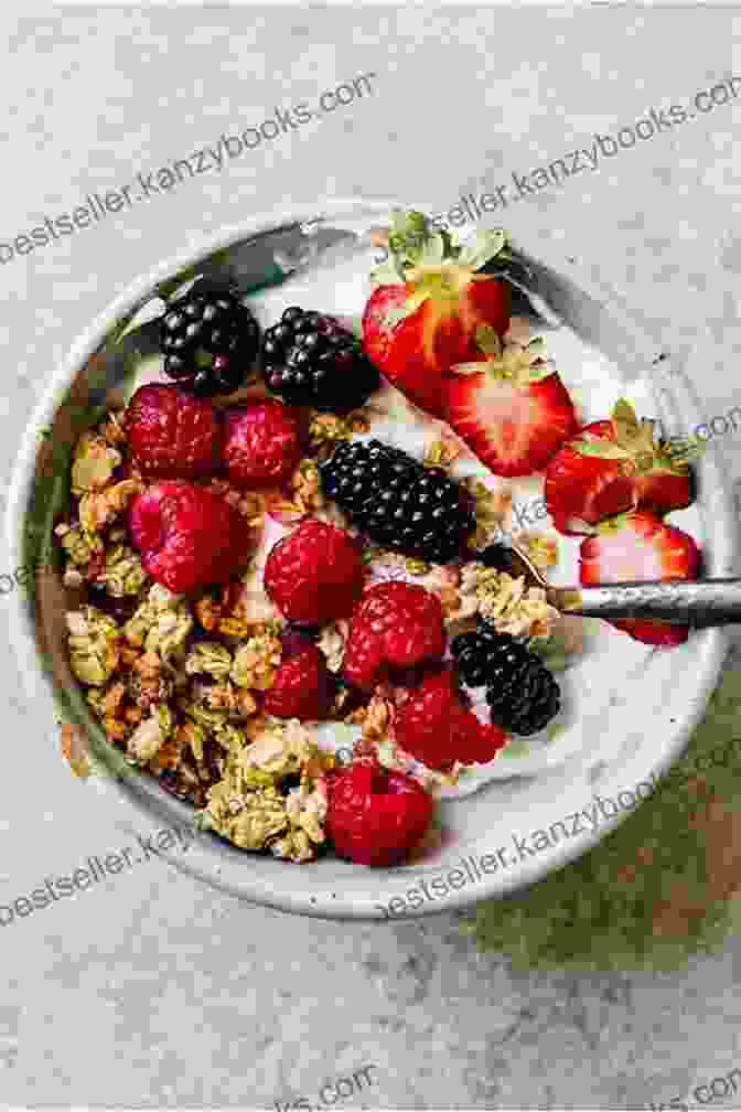 A Vibrant Breakfast Bowl Filled With Yogurt, Berries, Granola, And Honey Delicious Yogurt Recipes: Recipes You Can Make With Yogurt